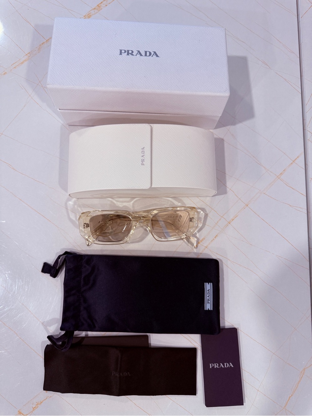Prada Clear Beige Rectangular Sunglasses with Light Brown Lenses